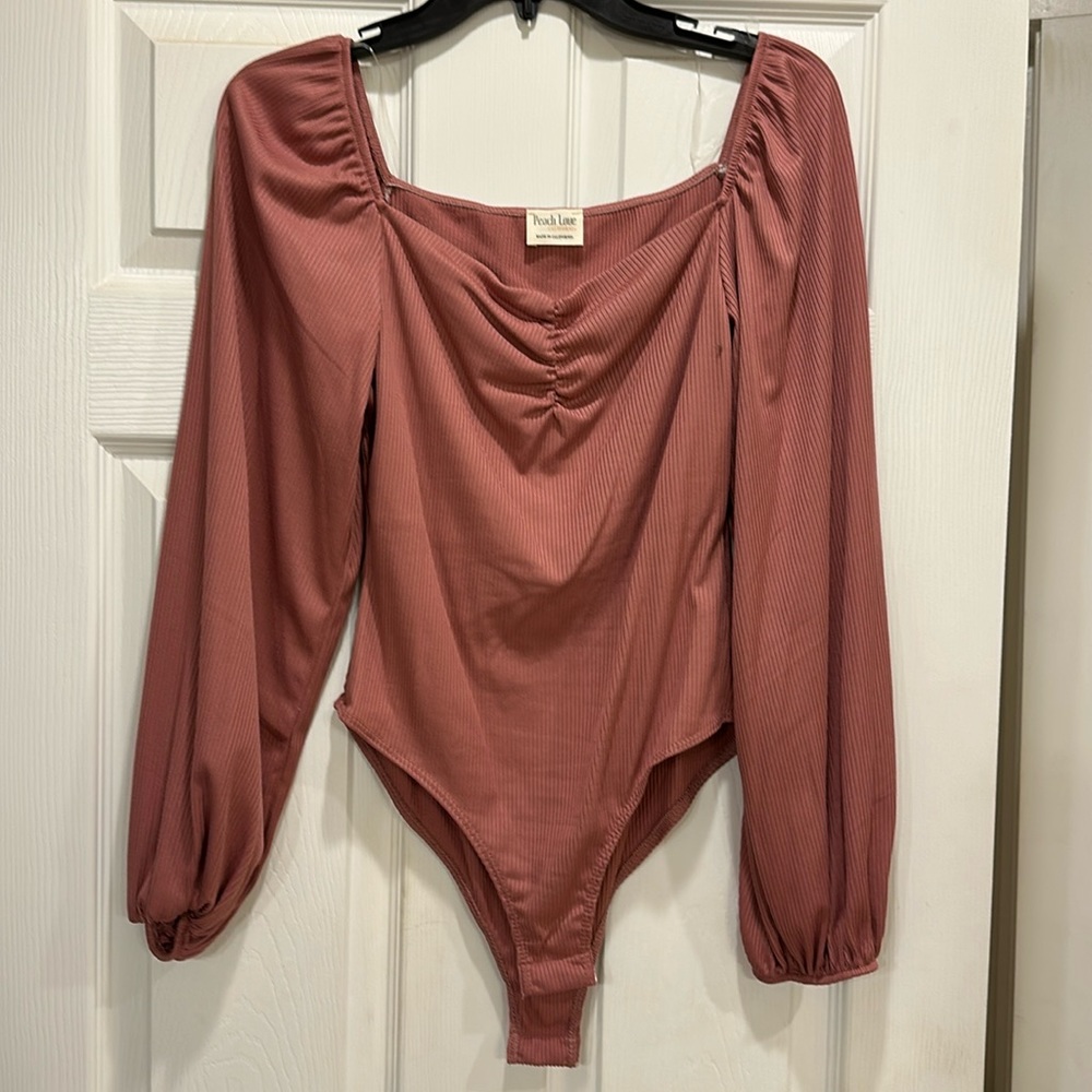 Mauve pink onesie. Super cute for date night!
